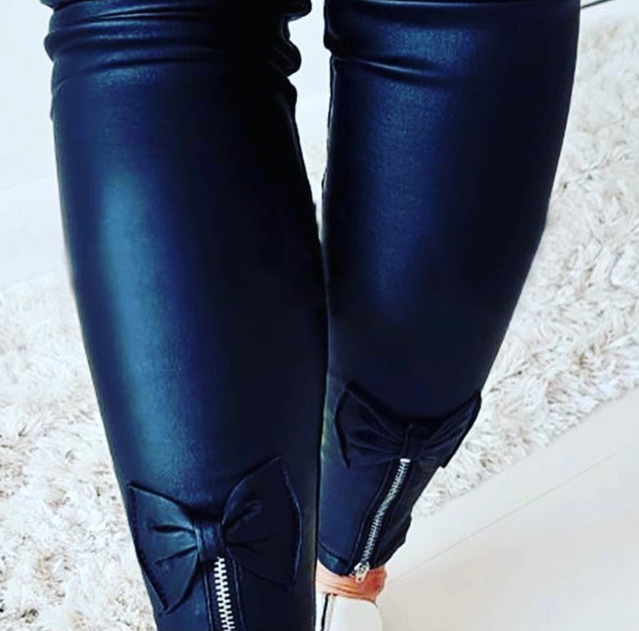 Black soft leather pants perfect for falls, winter early spring, late summer. This stylish pants add a touch of classy look to any occasion pair with some lovely stiletto or some stylish flat.   zipper to the leg  Bow to the back   stretches   comfortable 